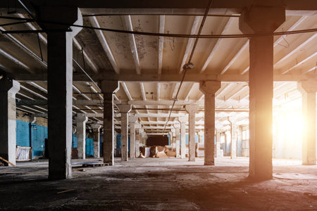 Large empty abandoned industrial hall.