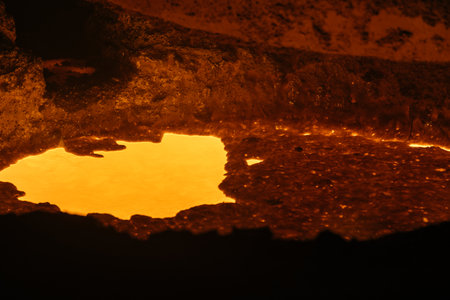 Hot molten metal, close up.の写真素材