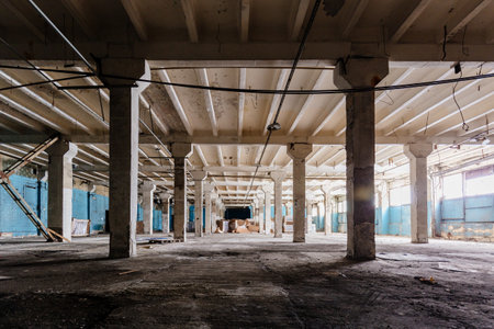 Large empty abandoned industrial hall.の写真素材