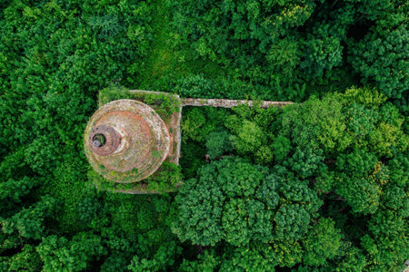 Old overgrown ruined abandoned church, aerial view. Church of the Icon of the Mother of God The Sign, Drezgalovo, Lipetsk region.の写真素材