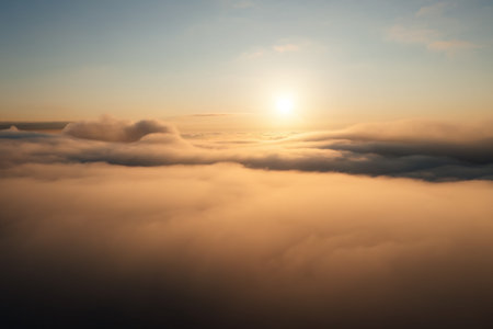 Above the clouds at sunset.