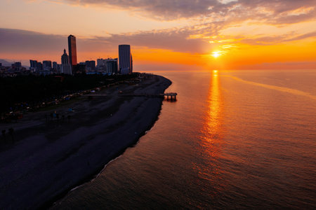Drone aerial panoramic view of evening sunset at Batumi City, Georgia.の写真素材