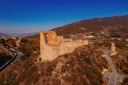 Ancient old fortress. Bebristsikhe castle ruin in mountains, aerial drone view.