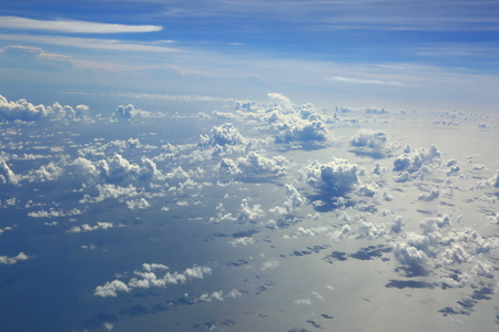 Aerial view of beautiful white clouds in blue sky. Nice backgroundの写真素材