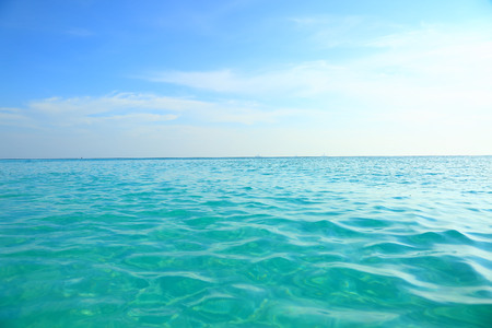Turquoise sea water and blue sky. Beautiful backgroundの写真素材