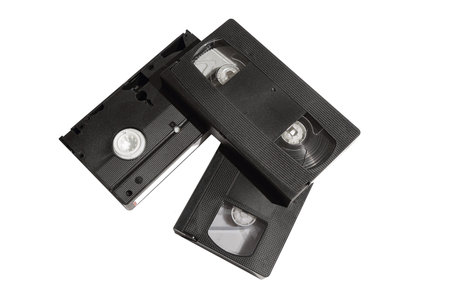 View of old video tape cassettes isolated on white background with clipping path