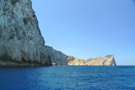 Amazing stone landscape and blue water of mediterranean sea. Beautiful background. Spain. Palma de Majorca.の写真素材
