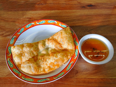 Close up view of one of traditional uzbekistan food and green tea on wood background. Food and drink...