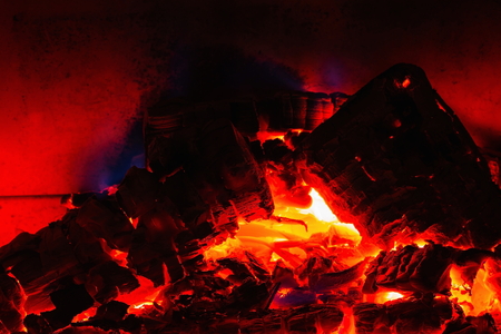 Close up view of burning wood in fireplace. Beautiful backgrounds.の写真素材