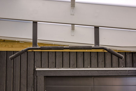 Close up view of outdoor mounted pull up bar. Healthy life style concept.