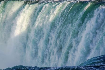 Gorgeous view of Niagara Falls landscape.Waves rumbling against the rocky shore. Beautiful nature backgrounds.のeditorial素材