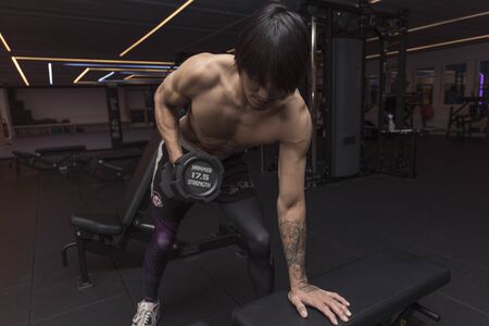 Young male exercising powerlifting. Healthy lifestyle concept. Enkoping. Sweden. 11/07/2019のeditorial素材