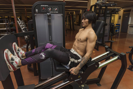 Close up view of young male training in gym. Sport and healthy lifestyle concept. Enkoping. Sweden...