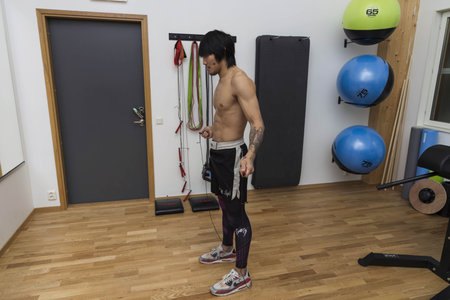Close up view of young male training in gym. Sport and healthy lifestyle concept. Enkoping. Sweden...
