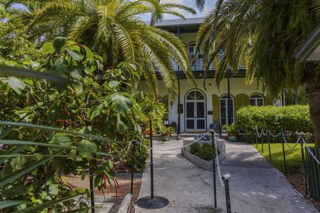 View on The Ernest Hemingway Home and Museum. Beautiful green trees at the entrance checkpoint. USA Key West. Florida.のeditorial素材