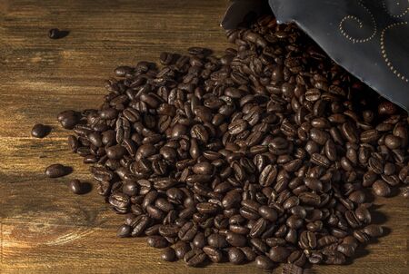 Roasted coffee beans for backgrounds. Beautiful background. Food and drink concept.の写真素材