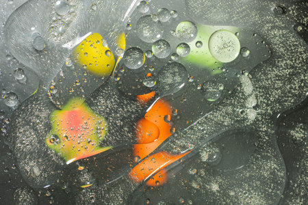 Green, orange, black, yellow colorful abstract design, texture. Beautiful backgrounds.
