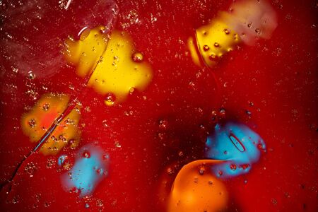 Close up view orange, blue, yellow, red colorful abstract design, texture. Beautiful backgrounds.の写真素材