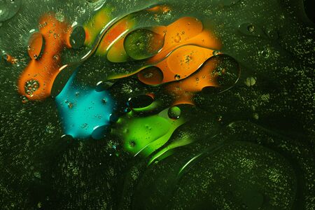 Dark green, orange, blue, yellow colorful abstract design, texture. Beautiful backgrounds.の写真素材