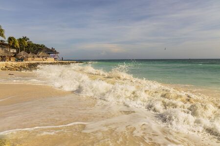 Amazing beauty Eagle Beach of Aruba Island. Caribbean sea beach. Beautiful nature background.の写真素材