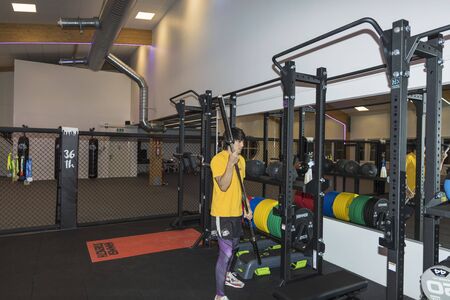 Close up view of young male training in gym. Sport and healthy lifestyle concept. Enkoping. Sweden 07/11/2019のeditorial素材