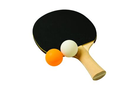 Close up view of black racket for table tennis with orange and white balls isolated. Table tennis game concept. Sport and healthy lifestyle backgroundの写真素材