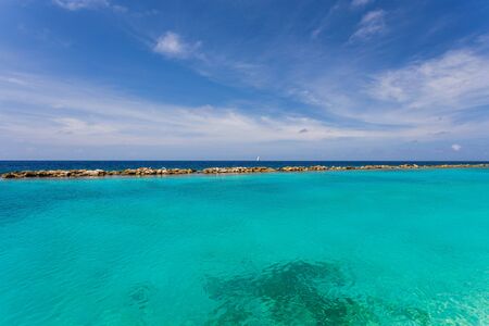Beautiful view of coast line of Atlantic ocean. Turquoise sea water and blue sky. Curacao island .. Beautiful nature background.の写真素材
