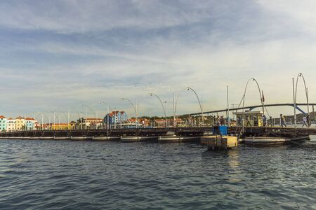 Gorgeous view of the moving pontoon Queen Emma Bridge across St. Anna Bay. Willemstad. Curacao. 19/09/2019のeditorial素材