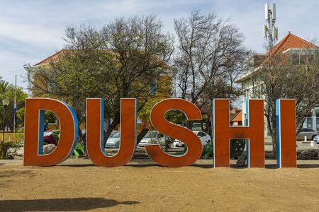 Close up view of big orange letters of word DUSHI. Willemstad. Curacao.の写真素材
