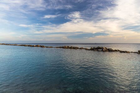 Gorgeous colorful view of sunset on Curacao island. Beautiful nature landscape. Caribbean.の写真素材