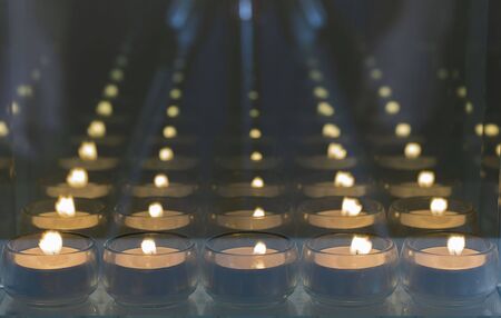 Beautiful view of candlelights with mirror reflection. Holidays romantic concept.の写真素材