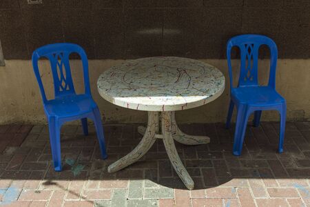 Beautiful composition of traditional furniture on walking street. Tourism concept.Willemstad, Curacao.の写真素材