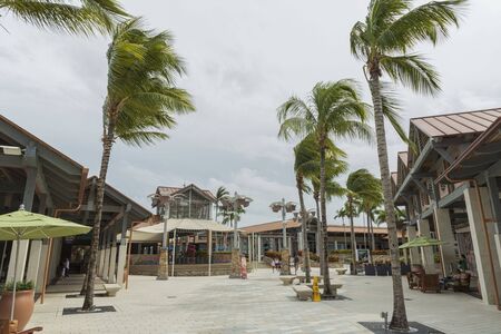 Beautiful landscape view of shopping mall center. Wonderful pond decorated with big rocks on front line. USA Miami 22/09/2019.のeditorial素材