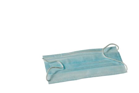 Close up view of white blue face mask isolated on white background.の写真素材