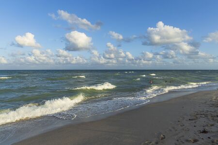 Amazing view of turquoise water of Atlantic ocean and blue sky with white clouds. Miami Beach. Beautiful nature background.の写真素材