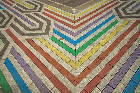 Close up view of colorful pavement stone walkway background. Colorful Stone pavement texture....