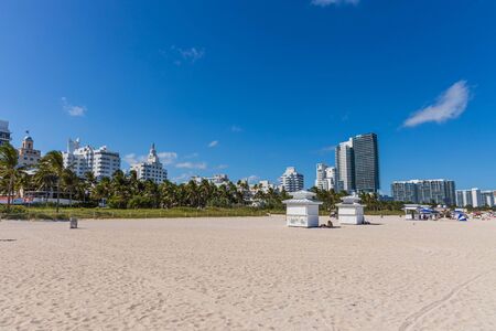Beautiful landscape view of Miami South Beach coast line. Sand beach, Atlantic Ocean, people on blue sky background. USA Miami Beach. 24/09/2019.のeditorial素材