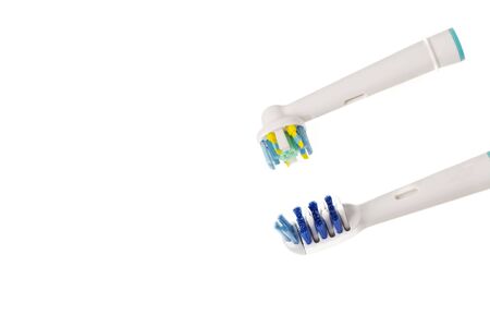 Two kinds of head for toothbrush close up view isolated. Health care concept.の写真素材