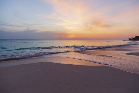 Amazing sunset on Eagle Beach of Aruba Island. Caribbean.Unforgettable view. Beautiful nature landscape.の写真素材