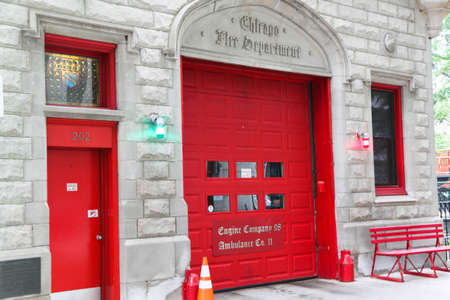 Close up view of red entrance door to Chicago Fire Department. USA Chicago 11/18/2014.のeditorial素材