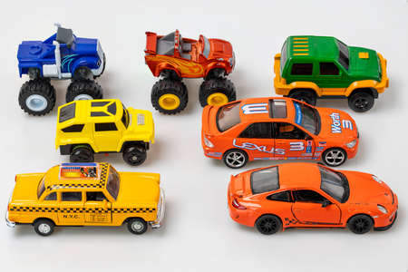 View of toy cars models carefully put each on it's place by child. Children concept. Uppsala. Sweden 04.17.2020.のeditorial素材