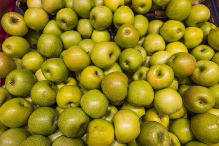 Close up macro view of green apples. Healthy food concept. Beautiful nature fruits background.の写真素材