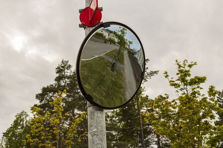 View of spherical viewing mirror for so-called dead zone. Driving safety concept.の写真素材