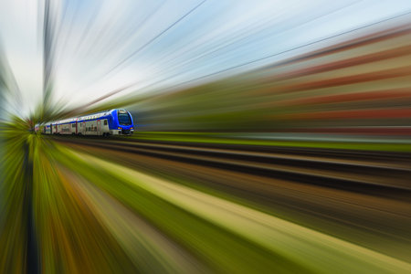Beautiful view of speed train on blurred landscape. Beautiful backgrounds.