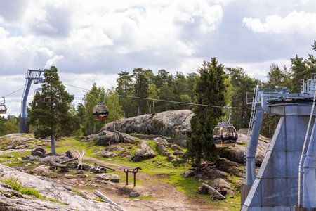 Gorgeous view of cable car way in zoo Sweden. Europe. Beautiful nature landscape background. Kolmarden, Sweden. 08.25.2020.のeditorial素材