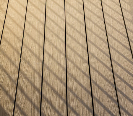 Beautiful background texture in form of light brown planks