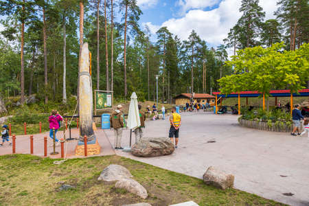 Beautiful landscape view of people.at entrance to Safari Zoo. Kolmorgen. Sweden. 09.25.2020.のeditorial素材