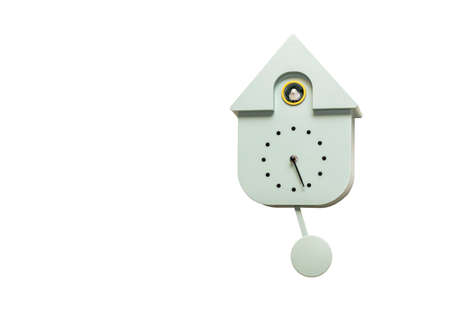 Close up view of gray wall cuckoo clock on white background. Sweden.の写真素材