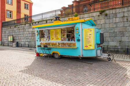 Beautiful view of colorful outdoor snack bar on street of Uppsala. Sweden. 05.12.2021.のeditorial素材