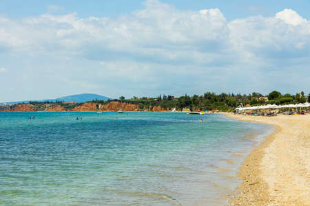 Amazing beauty white sand beach of Greece. Turquoise sea water and blue sky. Beautiful background.の写真素材